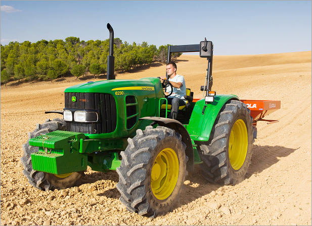 Oil platform in the ocean with the sun setting behind it (25)